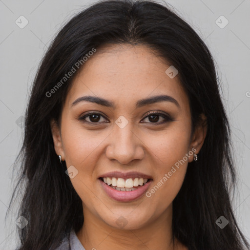 Joyful latino young-adult female with long  brown hair and brown eyes