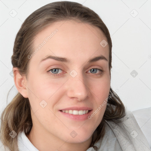 Joyful white young-adult female with medium  brown hair and blue eyes