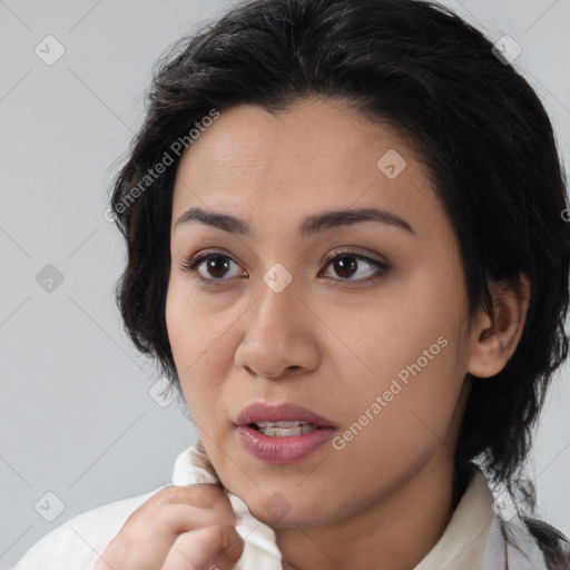 Joyful white young-adult female with medium  black hair and brown eyes