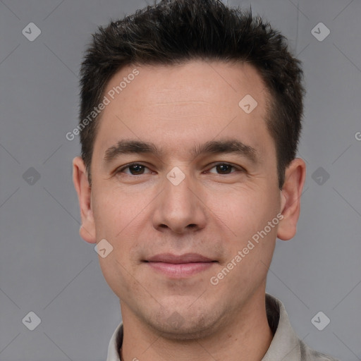 Joyful white adult male with short  brown hair and brown eyes