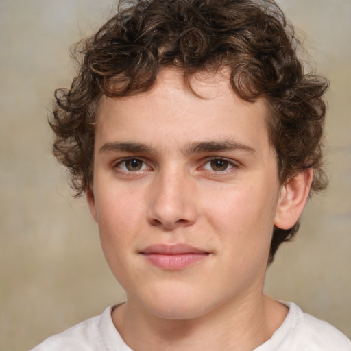 Joyful white child male with medium  brown hair and brown eyes