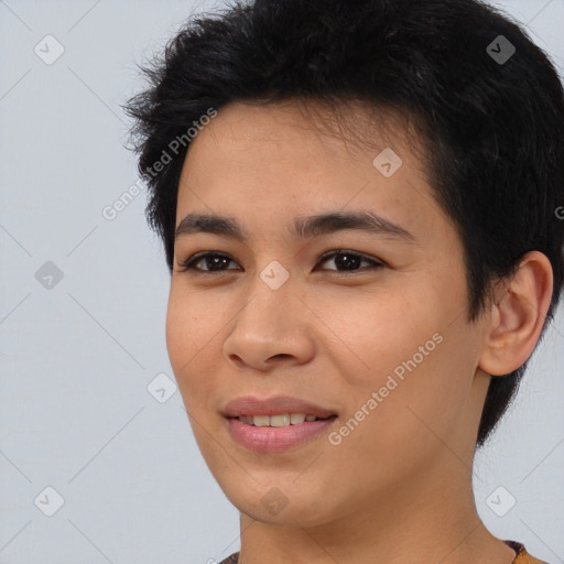 Joyful asian young-adult female with short  black hair and brown eyes