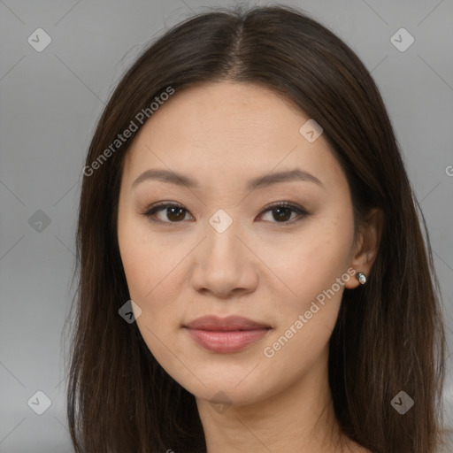 Joyful asian young-adult female with long  brown hair and brown eyes