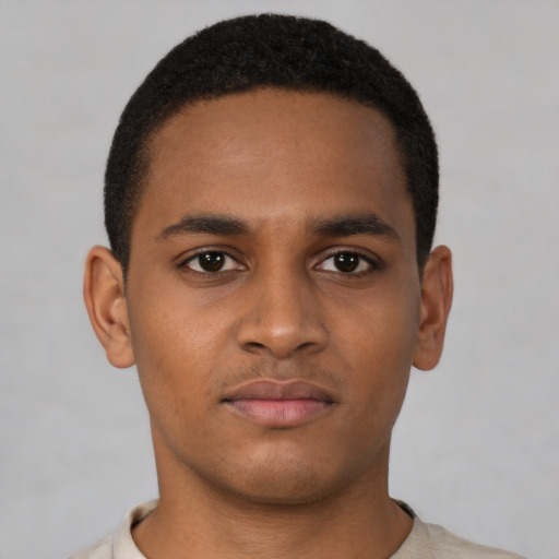 Neutral latino young-adult male with short  brown hair and brown eyes