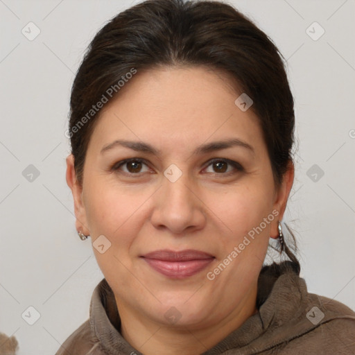 Joyful white adult female with short  brown hair and brown eyes