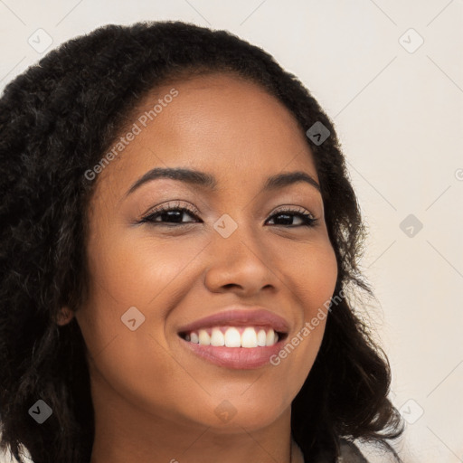 Joyful latino young-adult female with long  brown hair and brown eyes