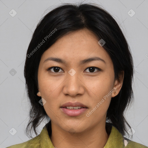 Joyful asian young-adult female with medium  black hair and brown eyes