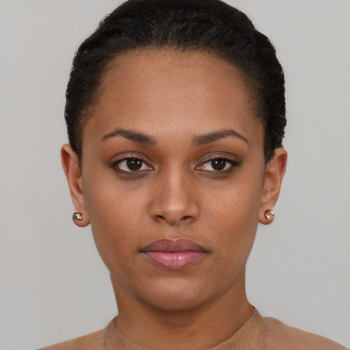 Neutral black young-adult female with short  black hair and brown eyes