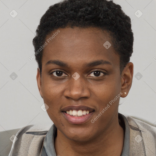 Joyful black young-adult female with short  black hair and brown eyes