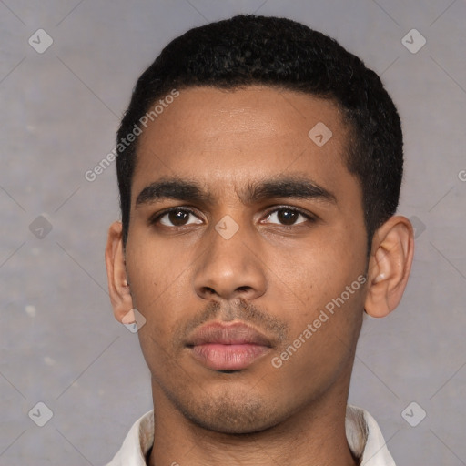 Neutral latino young-adult male with short  black hair and brown eyes