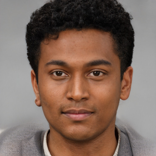 Neutral latino young-adult male with short  brown hair and brown eyes