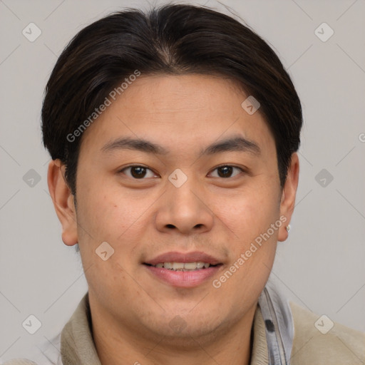 Joyful asian young-adult male with short  brown hair and brown eyes