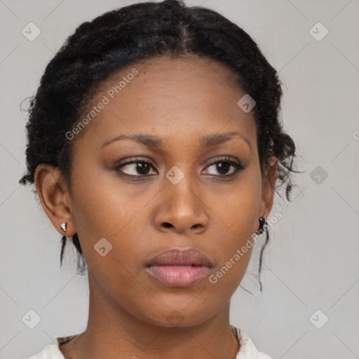 Neutral black young-adult female with medium  brown hair and brown eyes