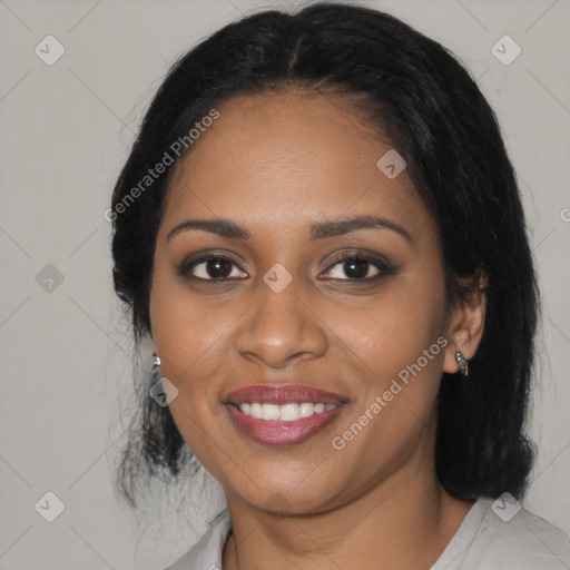 Joyful black young-adult female with medium  black hair and brown eyes