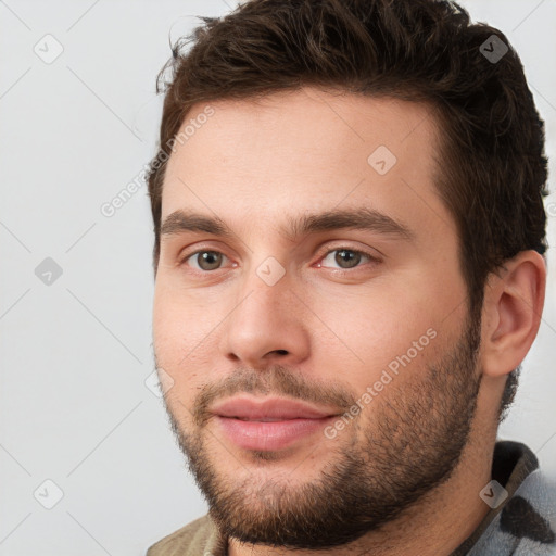 Neutral white young-adult male with short  brown hair and brown eyes