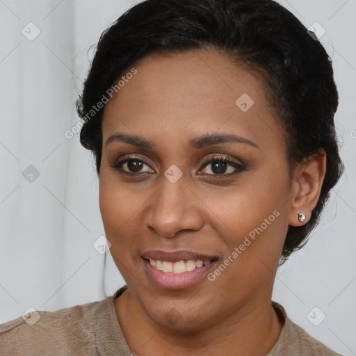 Joyful latino young-adult female with short  brown hair and brown eyes