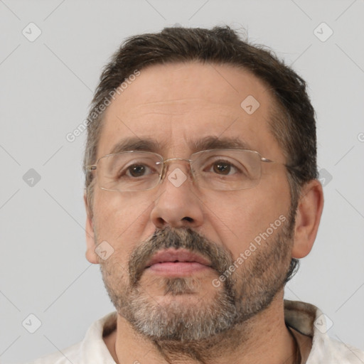 Neutral white adult male with short  brown hair and brown eyes