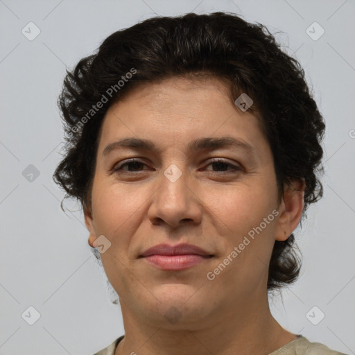 Joyful white adult female with short  brown hair and brown eyes