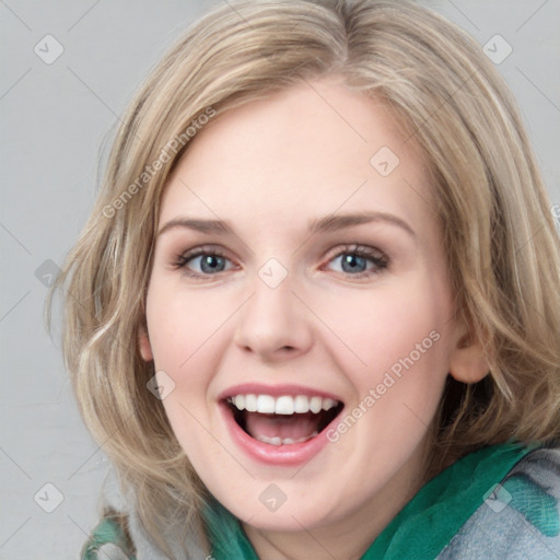 Joyful white young-adult female with medium  brown hair and blue eyes