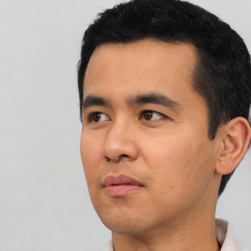 Neutral asian young-adult male with short  black hair and brown eyes