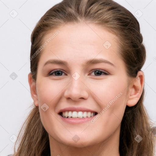 Joyful white young-adult female with long  brown hair and grey eyes