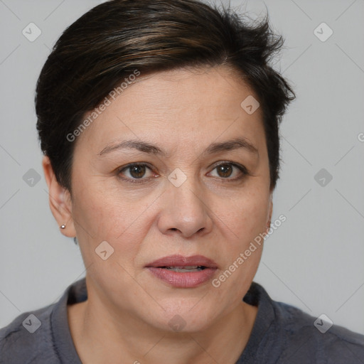 Joyful white adult female with medium  brown hair and brown eyes