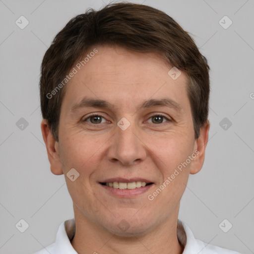 Joyful white adult male with short  brown hair and brown eyes