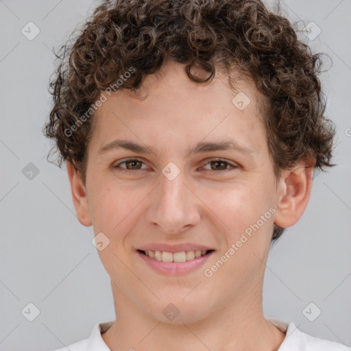 Joyful white child male with short  brown hair and brown eyes