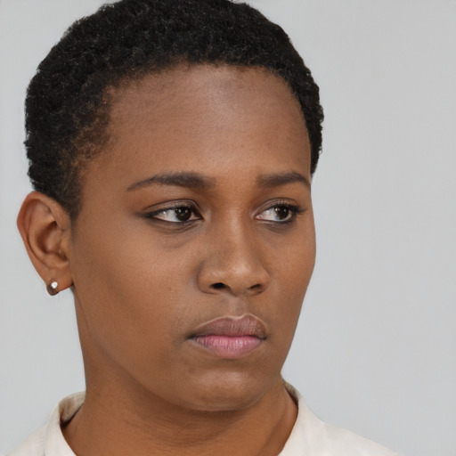 Neutral black young-adult female with short  brown hair and brown eyes