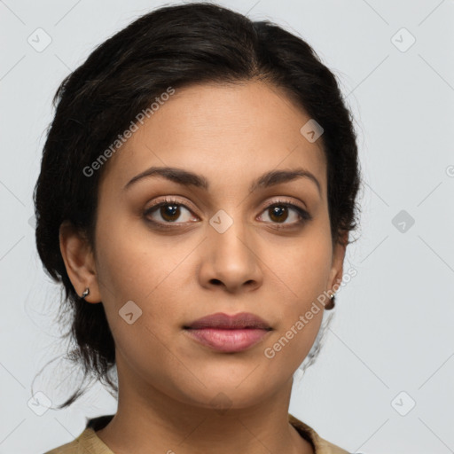 Joyful latino young-adult female with medium  brown hair and brown eyes