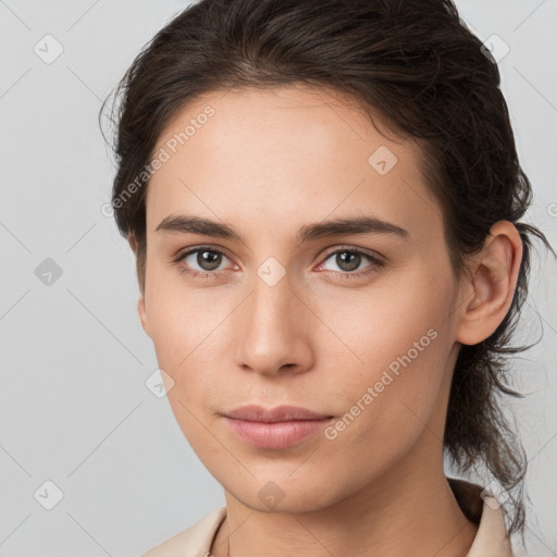 Neutral white young-adult female with medium  brown hair and grey eyes