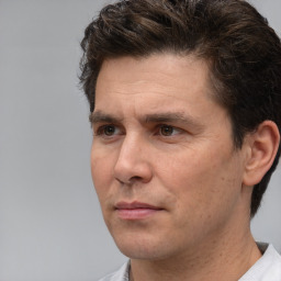 Neutral white adult male with short  brown hair and brown eyes