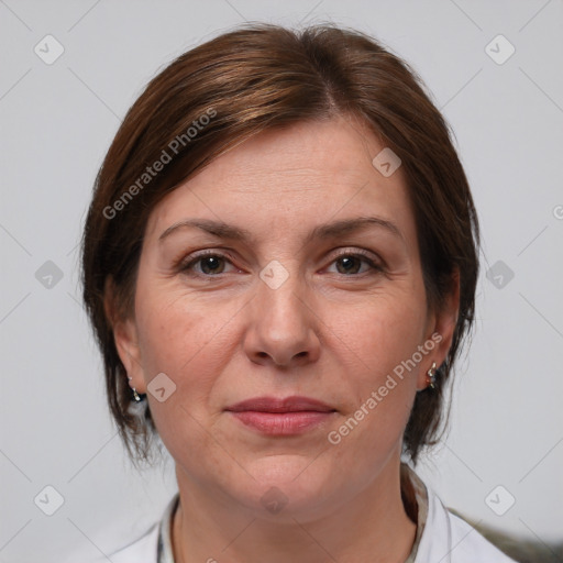 Joyful white adult female with medium  brown hair and grey eyes