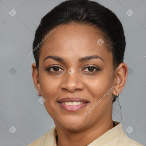 Joyful latino young-adult female with short  black hair and brown eyes