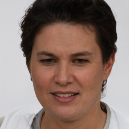 Joyful white adult female with short  brown hair and brown eyes