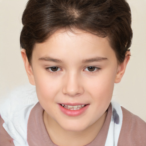 Joyful white child female with short  brown hair and brown eyes