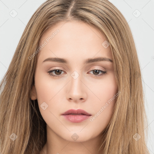 Neutral white young-adult female with long  brown hair and brown eyes