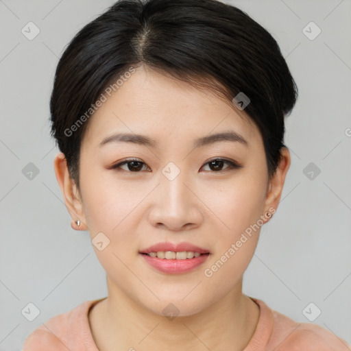 Joyful asian young-adult female with short  brown hair and brown eyes