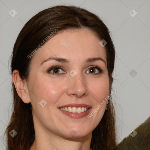 Joyful white young-adult female with long  brown hair and green eyes