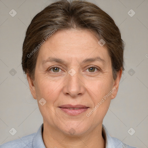 Joyful white adult female with short  brown hair and brown eyes