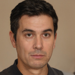 Neutral white adult male with short  brown hair and brown eyes