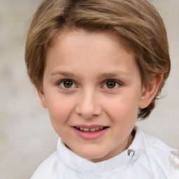 Joyful white child female with short  brown hair and brown eyes