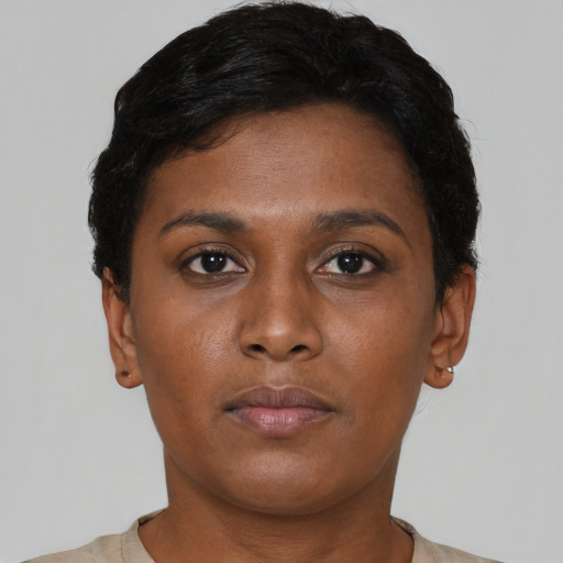 Neutral black young-adult female with short  black hair and brown eyes