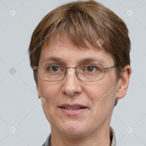 Joyful white adult female with short  brown hair and grey eyes