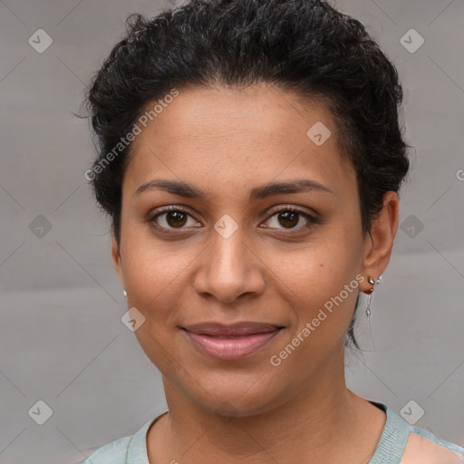 Joyful latino young-adult female with short  brown hair and brown eyes