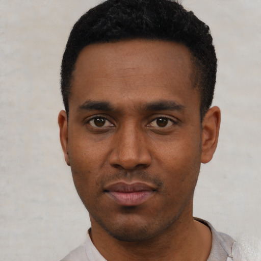 Neutral black young-adult male with short  black hair and brown eyes