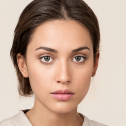 Neutral white young-adult female with medium  brown hair and brown eyes