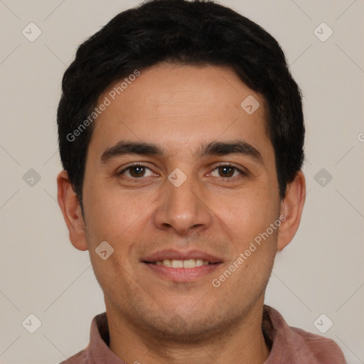 Joyful white young-adult male with short  black hair and brown eyes