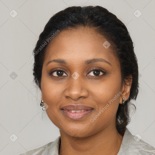 Joyful black young-adult female with medium  black hair and brown eyes