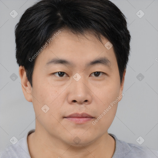 Neutral asian young-adult male with short  brown hair and brown eyes